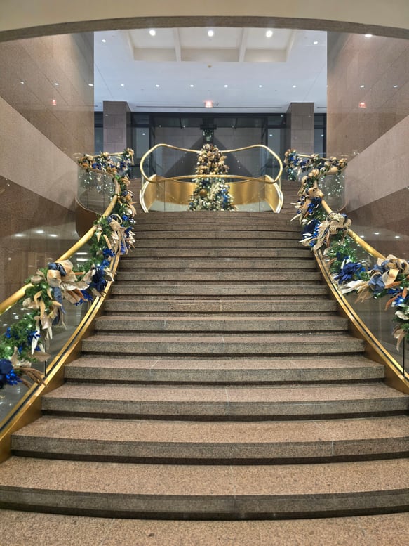 Holiday staircase design by Peachtree Plants